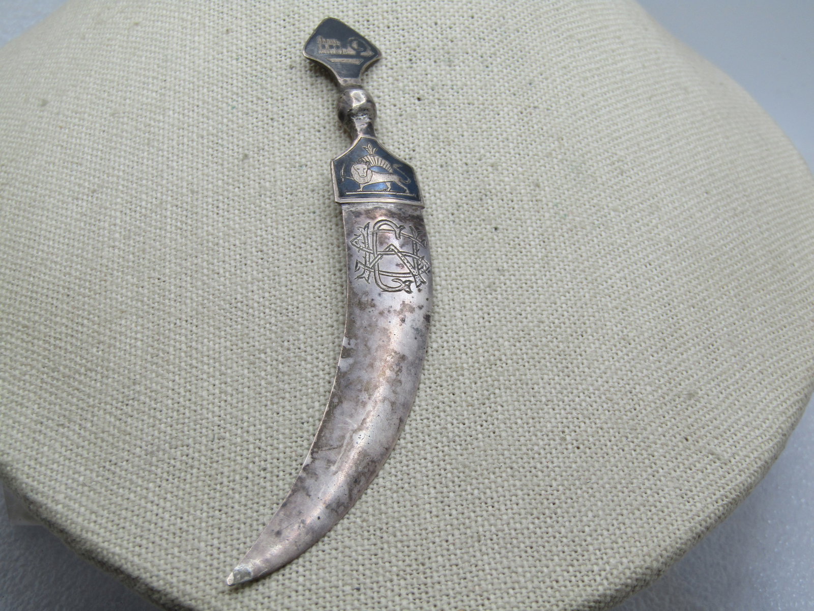 Vintage Sterling Enameled Short Saber Letter Opener, 1940's-1950's: Vintage Sterling Enameled Short Saber Letter Opener, 1940's-1950's. this is like the Siam/Niello pieces with the black enameling but the image is a lion at the top of the blade and a collesium