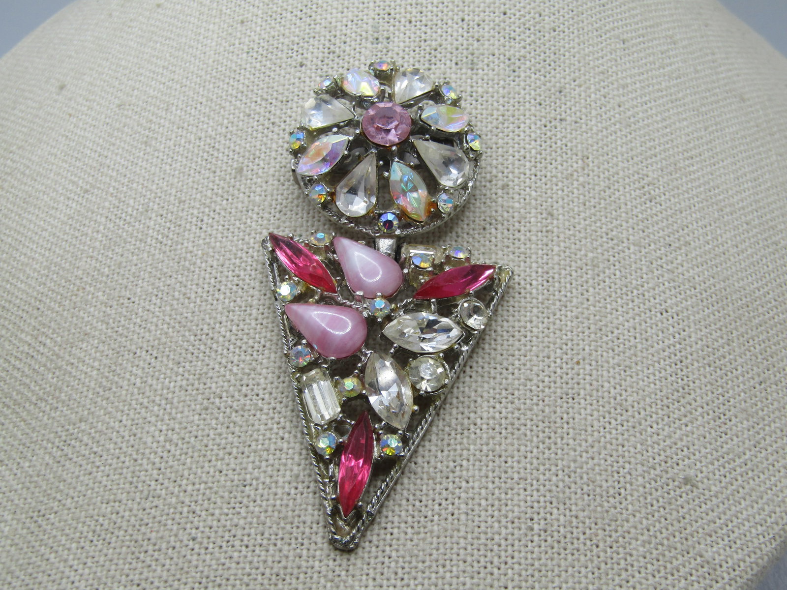 Vintage Round and Pointed Drop Brooch, Rhinestones, 1950's-1960's, 3": Vintage Round and Pointed Drop Brooch, Rhinestones, 1950's-1960's, 3" by 1.5". The circle has clear rhinestones with aurora borealis in pear and marquise with a center pink rhinestones. The top is app