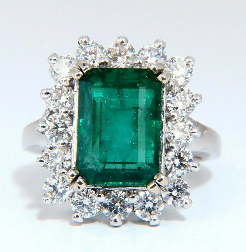 7.15ct Natural Emerald Diamonds Cluster Halo Ring 14kt**: Title: 7.15ct Natural Emerald Diamonds Cluster Halo Ring 14kt** Description: Prime Halo Mod Deco Green. 5.40ct. Natural Emerald Ring Emerald, Brilliant cut 12 x 8.3mm Diameter Transparent & Vivid Gree