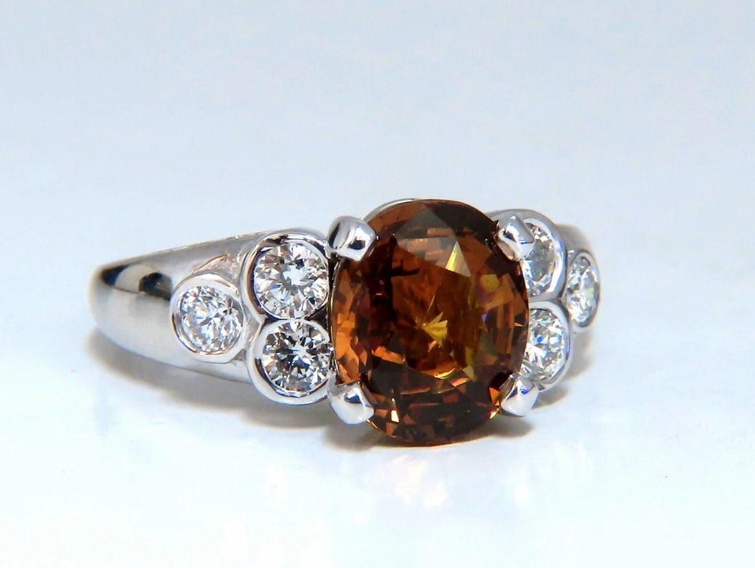 GIA Certified 4.75ct Natural No Heat Orange Brown Sapphire Diamond Ring 14kt**: Title: GIA Certified 4.75ct Natural No Heat Orange Brown Sapphire Diamond Ring 14kt** Description: Orange Brown Naturale GIA Certified 4.15ct. Natural Orange Brown Sapphire ring Full cut Oval brillian