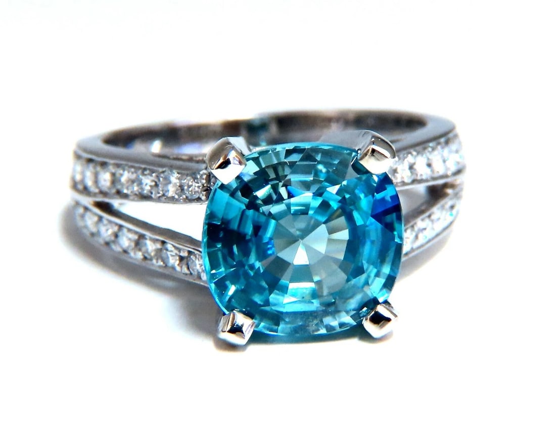 5.82ct Natural Indigo Blue zircon Diamonds Ring 14kt**: Title: 5.82ct Natural Indigo Blue zircon Diamonds Ring 14kt** Description: Indigo Blue Natural Zircon Ring 5.02ct. Natural Blue Zircon Cushion cut 9.5 X 9.8mm VS Clean Clarity, Transparent .80ct Side