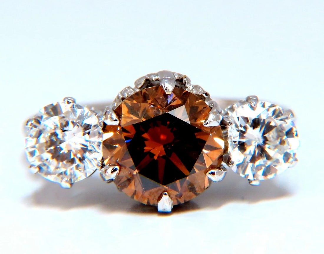 GIA certified 3.64ct Fancy Brown Orange Diamond ring 18 Karat Three Stone**: Title: GIA certified 3.64ct Fancy Brown Orange Diamond ring 18 Karat Three Stone** Description: Everlasting Beauty GIA Certified: 2.41ct Natural Fancy color diamond ring. Round, Brilliant Natural, Fan