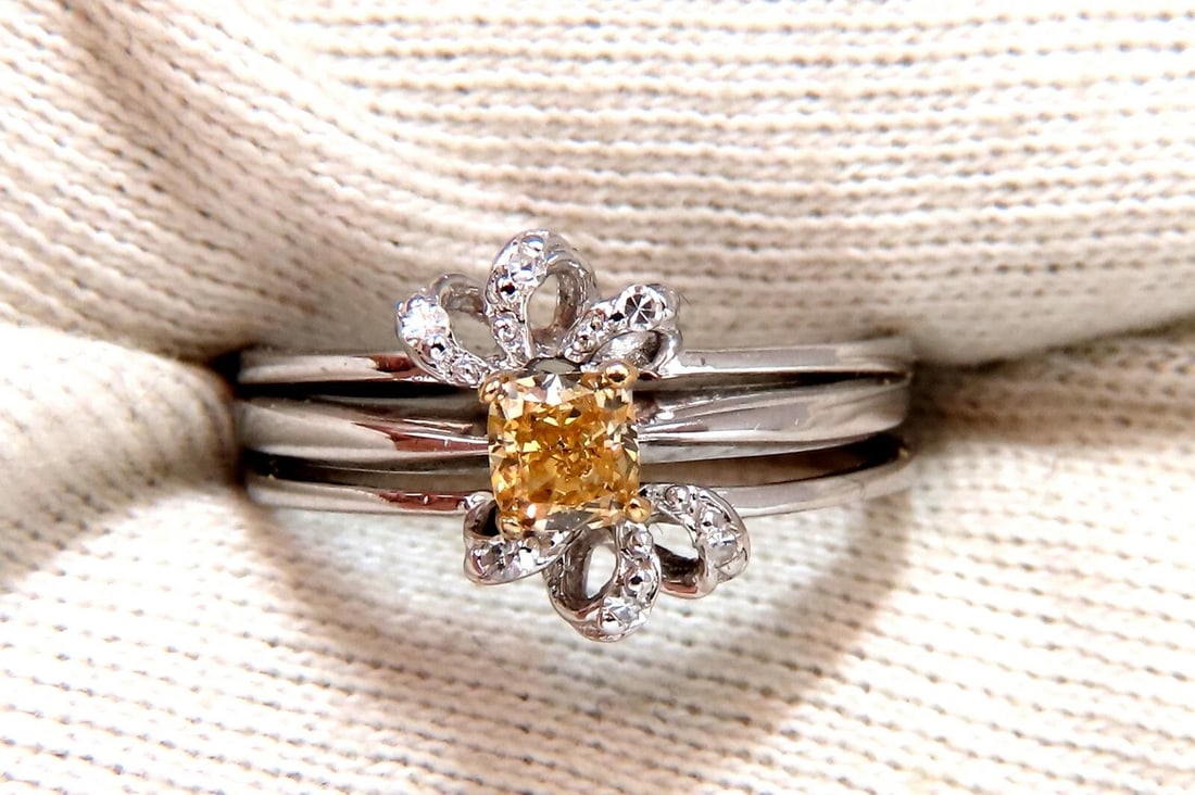 .58ct Natural Fancy Yellow Diamond ring 14 Karat**: Title: .58ct Natural Fancy Yellow Diamond ring 14 Karat** Description: Fancy Yellow Cluster Ring .48ct. Natural Yellow Diamond cushion Cut Si-1 clarity 4 X 4.3mm Side diamonds: .10ct. rounds, Full cut