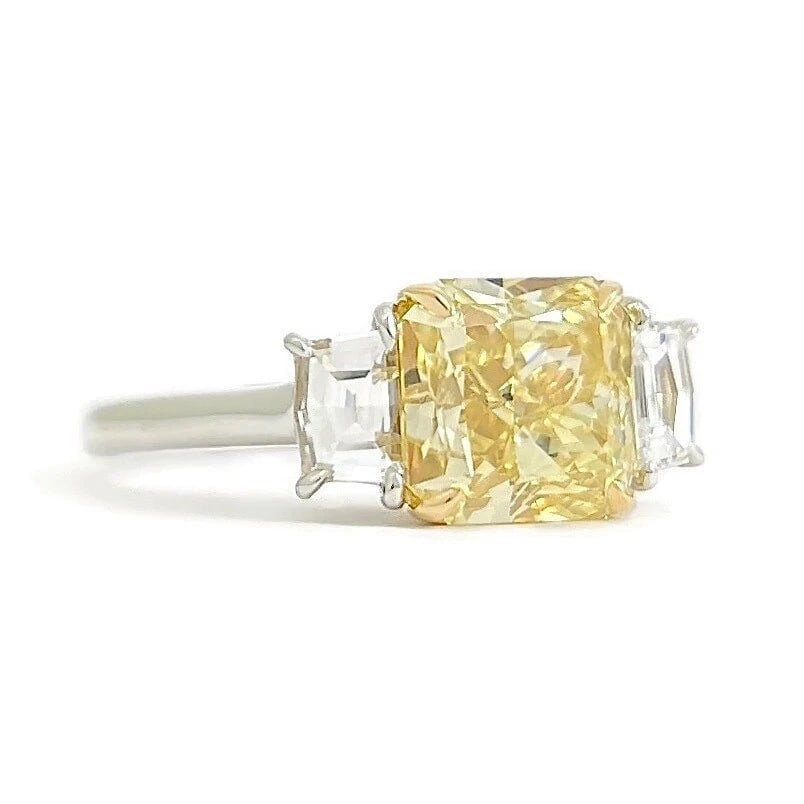 GIA Fancy Yellow Radiant 3-Stone Diamond Engagement Ring Platinum, 2.43 CTW: Title: GIA Fancy Yellow Radiant 3-Stone Diamond Engagement Ring Platinum, 2.43 CTW Description: GIA Fancy Yellow Radiant 3-Stone Diamond Engagement Ring Platinum, 2.43 CTW This is a gorgeous diamond e