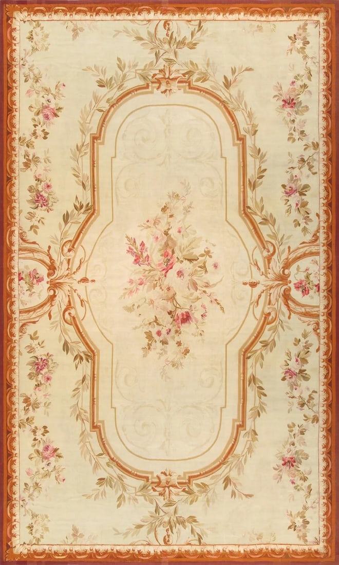 Antique Abusson Beige/Brown Rug, 11' 4" X 19' 0": This collection is hand crafted with the finest wool yarn. The rug is representative of 16th Century European Aubusson style with a center medallion and an open field with intricate floral pattern.