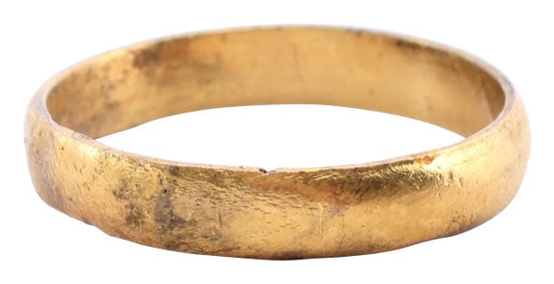 VIKING WEDDING RING, SIZE 10: 10th-11th century AD. Gilt bronze size 10, 4.0mm width, with slightly rounded face. Surface textured from burial. Vikings exchanged rings on the pommel of the groom’s sword. Professionally refur