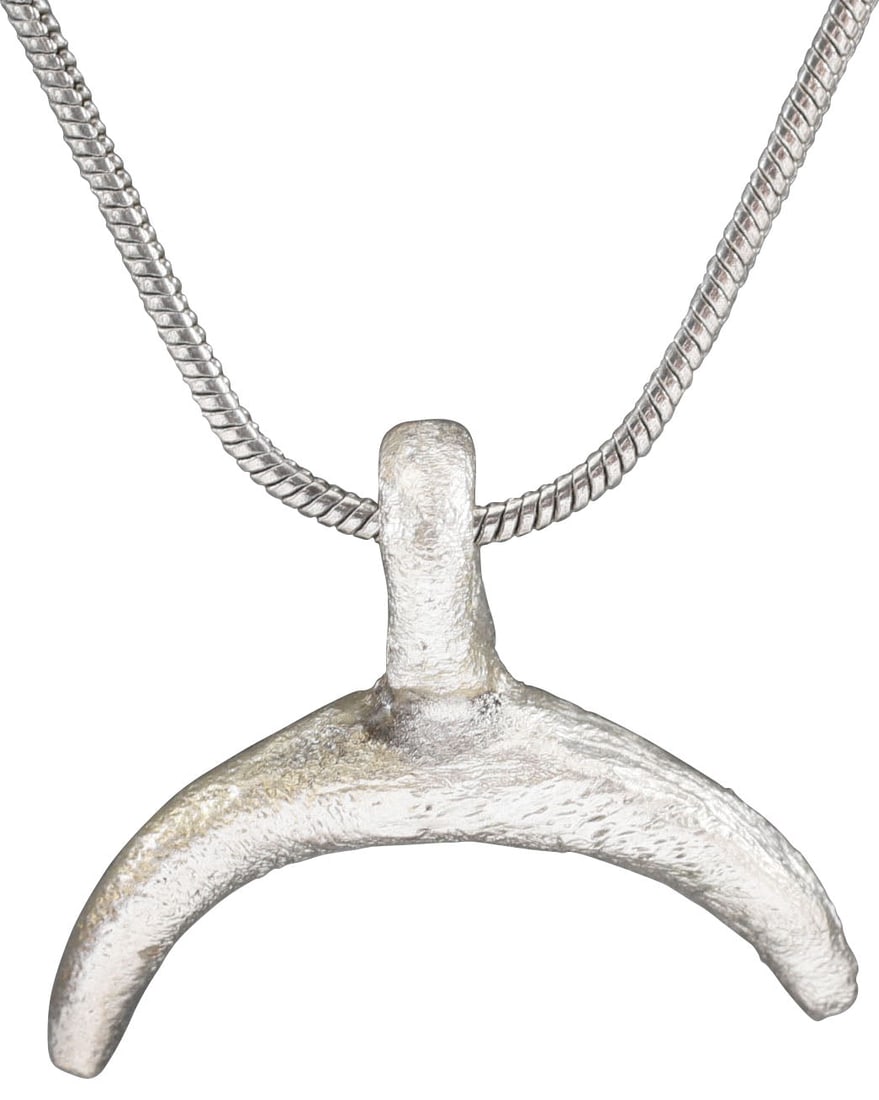 VIKING LUNAR PENDANT NECKLACE, C.950-1050 AD: Small example, just over 7/8” width (0.88”). As expert navigators, the constellations signified mystery and power to Vikings. The Moon was personified as Mani, brother to Sol the Sun, and