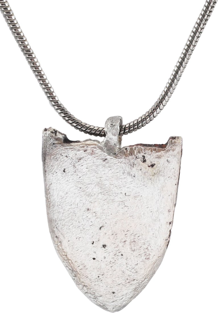 ENGLISH HERALDIC PENDANT NECKLACE C.1500 JEWELRY: Silvered bronze. Classic shield form with bouched top. Over 3/4" (0.77”) height. This was worn by a lady of the noble class and distinguished her as such in public. Professionally refurbished