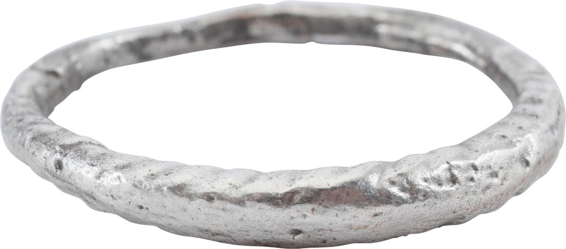 RARE VIKING WOMAN’S BANDE DE PERLES RING, SIZE 7 1/2: 9th-11th century AD. Silvered bronze wedding ring. Size 7 1/2 1.7mm width with pearled or roped motif half the circumference. Professionally refurbished with the pure silver overlay restored. See the