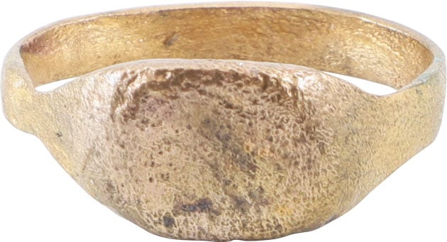 MEDIEVAL MAN’S RING C. 5TH-9TH CENTURY AD, SIZE 9 3/4: The period was known as the Dark Ages after the fall of the Roman Empire. Gilt bronze, size between 9 3/4 with 3.5mm rounded face band flaring to the shoulders. Lozenge shaped bezel with remnants of i