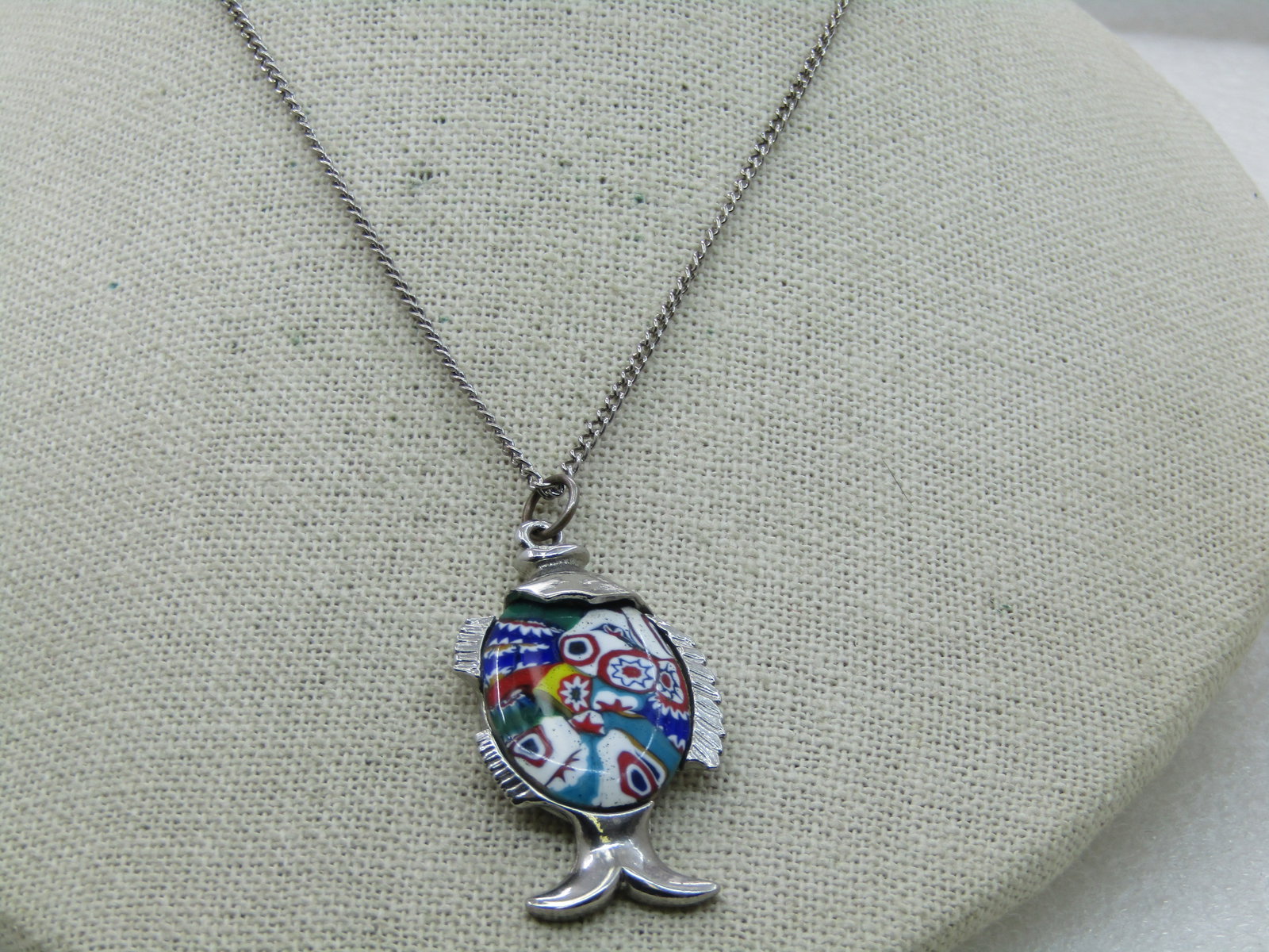 Vintage Faux Mosaic Fish Necklace, 18": Vintage Faux Mosaic Fish Necklace, 18", Silver Tone, 1960's-1970's. The fish pendant is appx. 1.75" long and almost 1" wide. It has a body that looks like mosaic but it is a single piece looking like