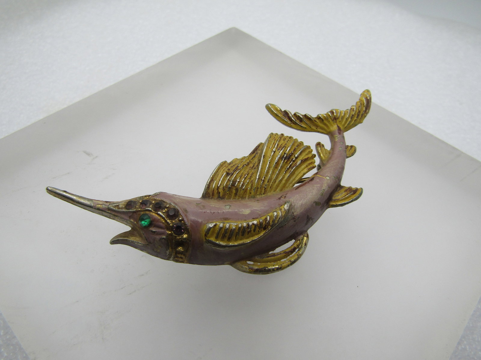 Vintage Enameled Marlin/Sail FIsh Brooch, Rhinestones, 1940's-1950's: Vintage Enameled Marlin/Sail FIsh Brooch, Rhinestones, 1940's-1950's. This is gold tone with pale lavender enameling on the body and yellow on the fins and tail, purple rhinestones around the face and
