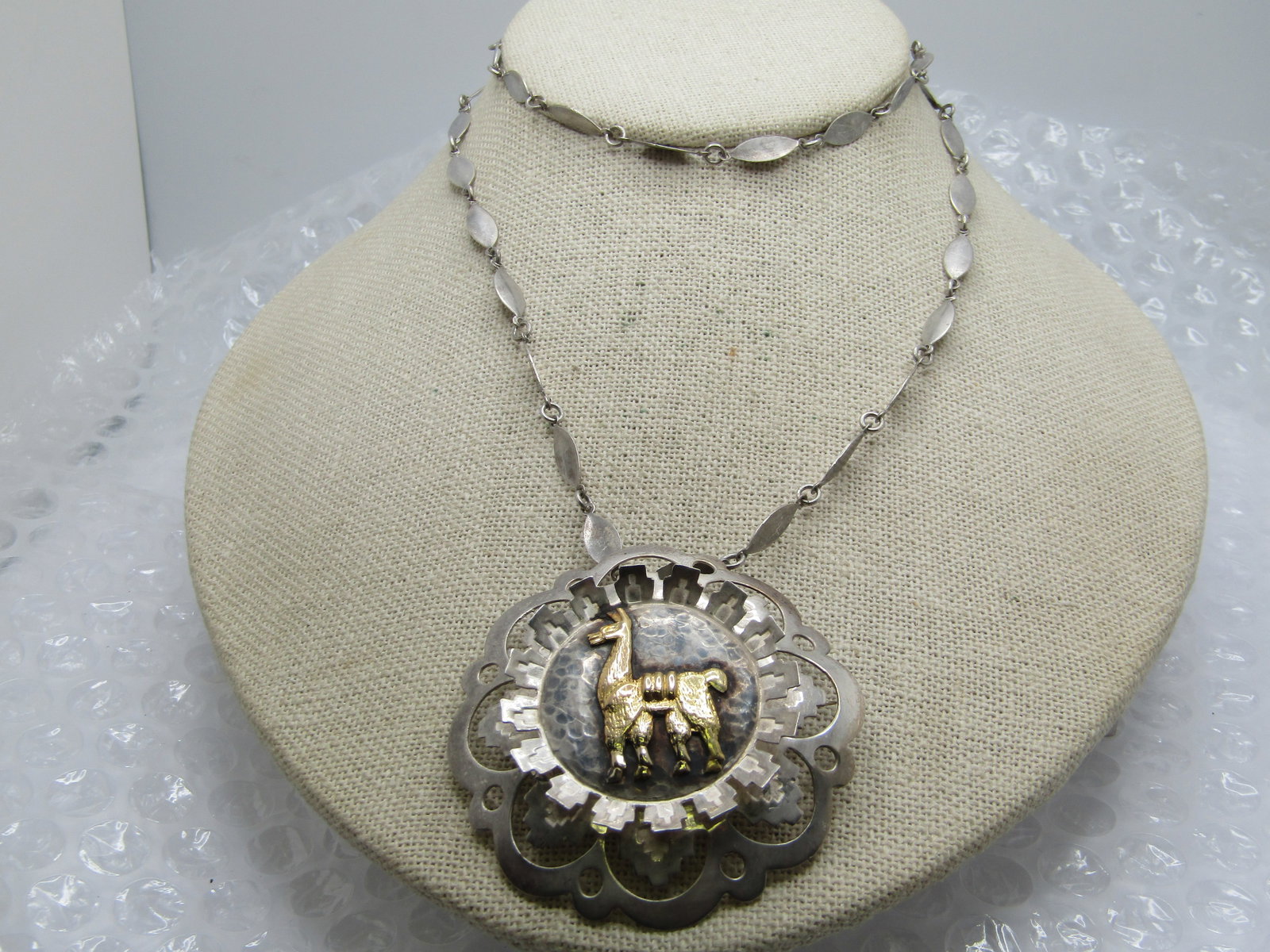 Vintage Sterling & 18kt Llama Filigree Necklace, Peru, 24": Vintage Sterling & 18kt Llama Filigree Brooch/Necklace, Peru, 24". The pendant can be used as a pendant or as a brooch. Marked .925 and 18kt and tested. Weight is appx. 23.12 gr. The pendant is