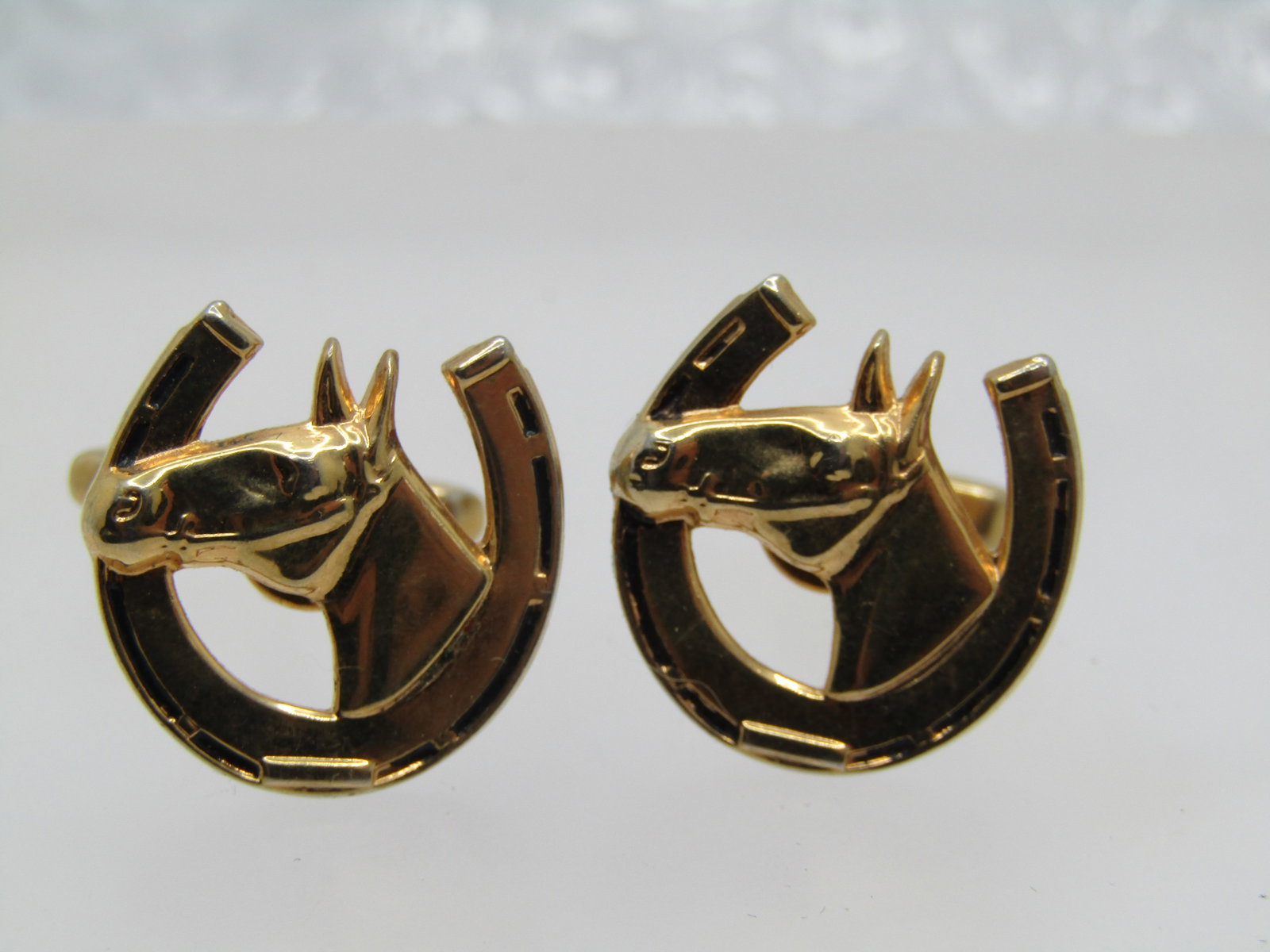 Vintage Equestrian Horse Shoe Cuff Links, 3/4": Vintage Equestrian Horse Shoe Cuff Links, 3/4". These have black enameling in the frame of the horseshoe - with some wear in the enameling but otherwise very good condition. There is a bright shiny