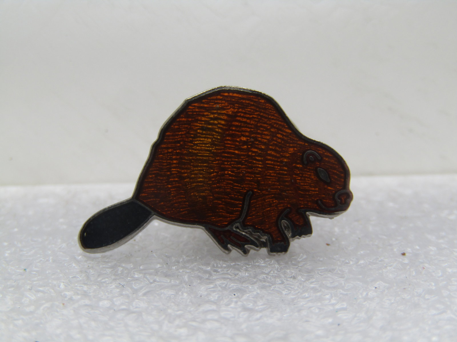 Vintage Enameled Beaver Tack Pin, 1980's-1990's: Vintage Enameled Beaver Tack Pin, 1980's-1990's. Cute beaver with a coppery brown body and black enameled tail. Nice quality. Silver tone on back with a Ballour clutch. Very good condition.