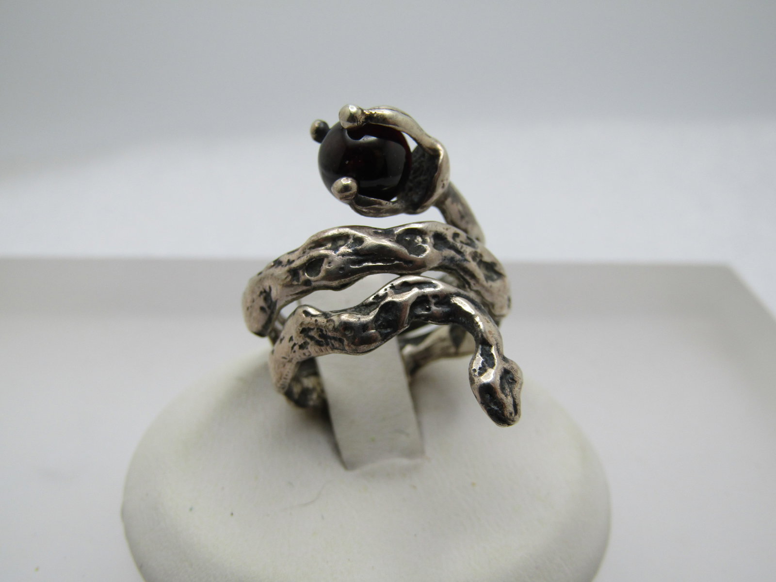 Vintage Sterling Wrapped Rattle Snake Ring, Amethyst Rattle, Sz. 5.75: Vintage Sterling Wrapped Rattle Snake Ring, Amethyst Rattle, Sz. 5.75. The snake tests as sterling with a weight of appx. 8.47 gr. It is a unique design - I could not find a mark by the maker but