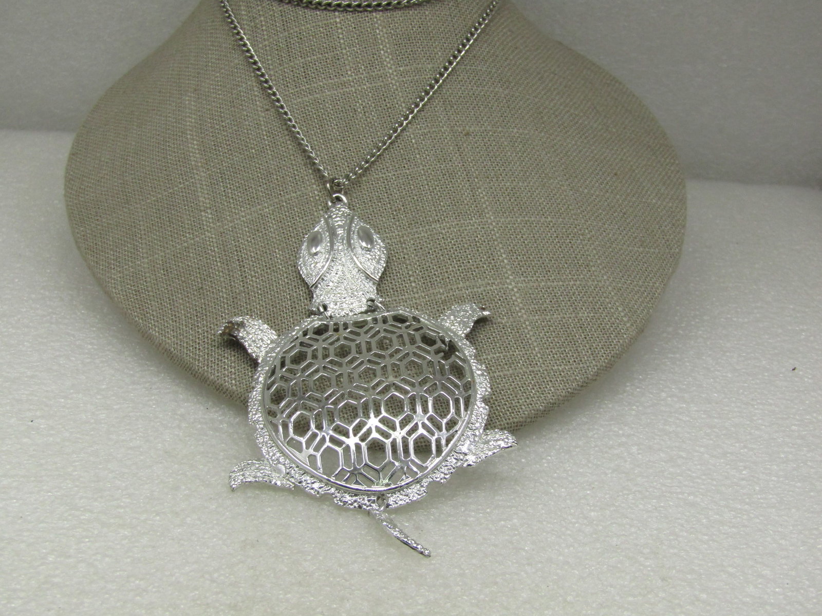 Vintage Jointed Turtle Necklace Silver Tone, 24", 1960's-1970's: Vintage Jointed Turtle Necklace Silver Tone, 24", 1960's-1970's. The turtle is appx. 4.75" long and 2.5" wide. Textured and smooth fnish. The chain is appx. 3mm wide. The turtle's head and tail are