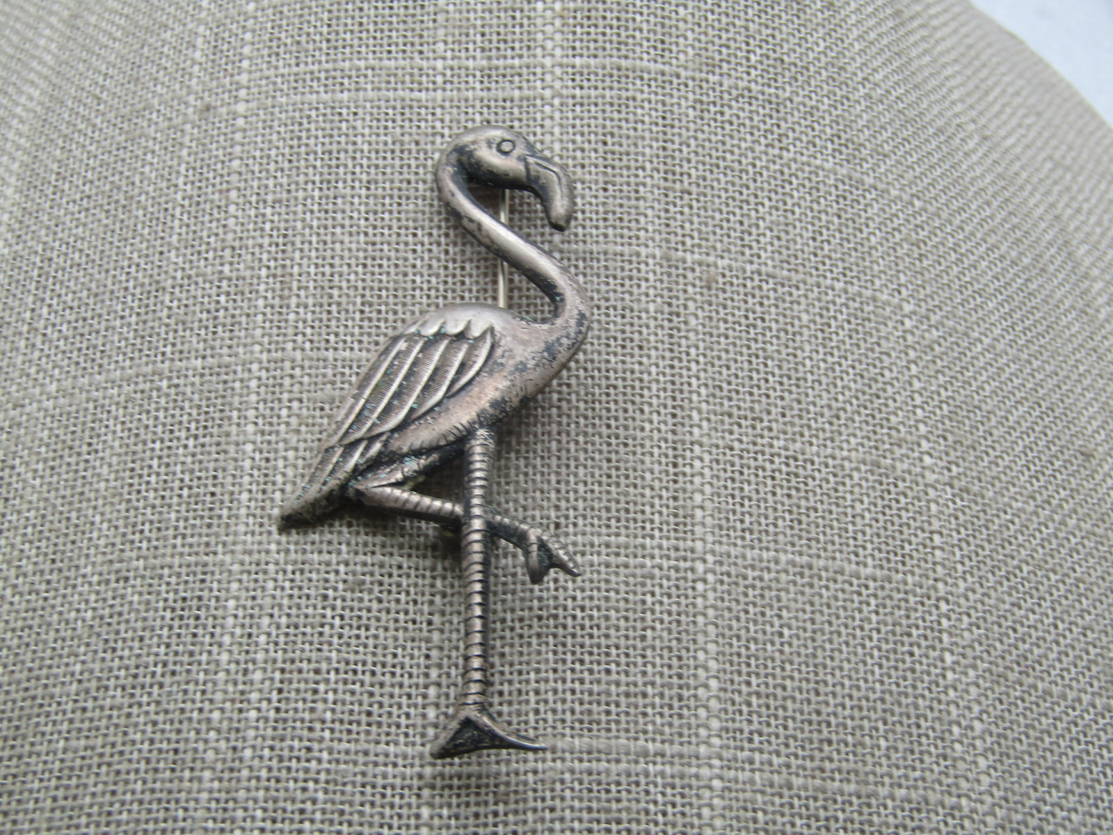 Vintage Sterling Flamingo Brooch, 1940's-1950's, 2.75" Tall: Vintage Sterling Flamingo Brooch, 1940's-1950's, 2.75" Tall and 1.25" Wide. It is not signed or marked. It does have oxidation that will polish away. It tests as sterling with a weight of appx.