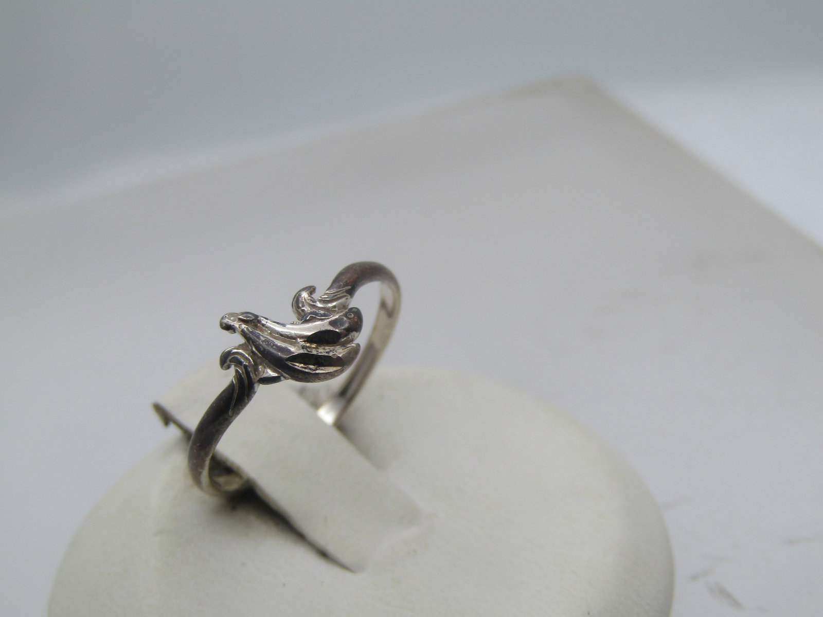 Vintage Sterling Double Dolphin Ring, Sz. 6, 1970's-1980's, Signed: Vintage Sterling Double Dolphin Ring, Sz.6, 1970's-1980's, Signed with a $ and marked sterling. It also tests as sterling with a weight of appx. .88 gr. It has two diamond-cut dolphins with a curved w