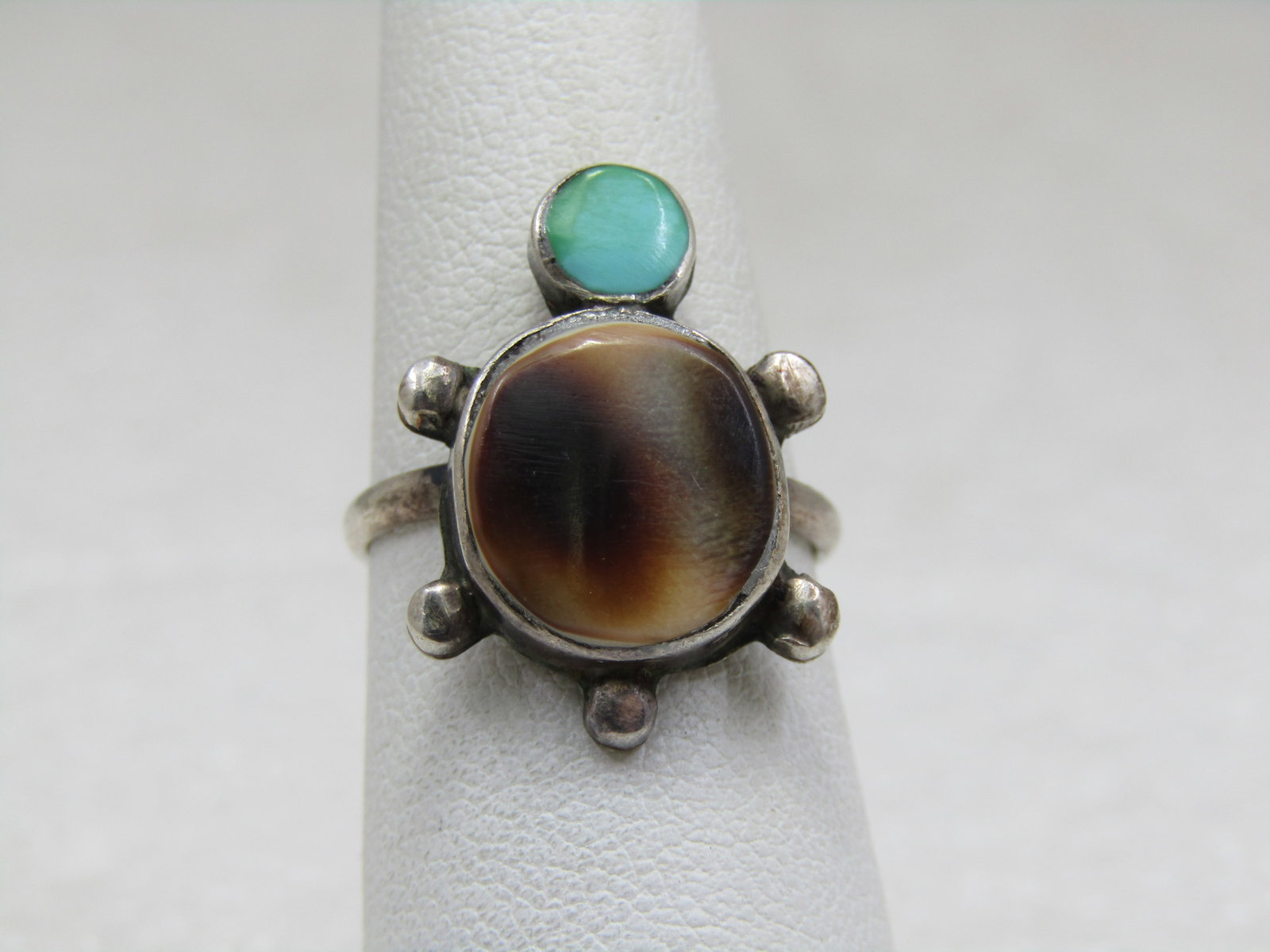 Vintage Southwestern Sterling Inlaid Turtle Ring, Sz. 5: Vintage Southwestern Sterling Inlaid Turtle Ring, Sz. 5. The turtle has a tortoiseshell body and turquoise head with silver bead legs and tail. It is appx. 7/8" down the finger and 3/4" across the