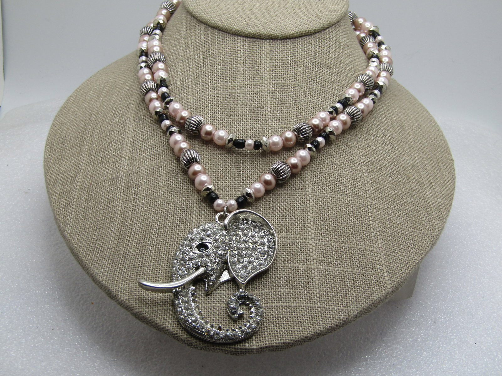 Rhinestone Elephant Double Strand Pink Pearl Necklace, 1990's-2000's, 14.75"Signed: Rhinestone Elephant Double Strand Pink Pearl Necklace, 1990's-2000's, 14.75"Signed Blu Milk Beads. Silver tone fluted and faceted beads and a pink faux pearl and darker pink too with black glass