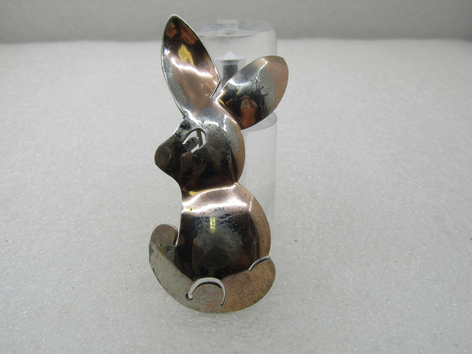 Vintage Sterling Silver Rabbit Brooch, 1960's, 2.75": Vintage Sterling Silver Rabbit Brooch, 1960's, 2.75" tall and 1-1/8" wide. It has a rose gold wash on top with some wear on the higher domed areas, otherwise it is in very good condition. Cut out