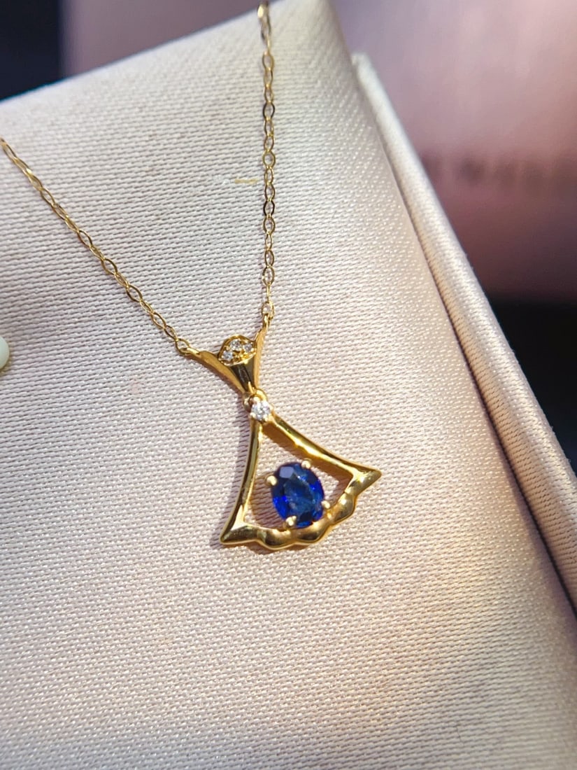 18K Gold Diamond and Sapphire Pendant: Title: 18K Gold Diamond and Sapphire Pendant Description: This gentle and romantic sapphire collarbone Pendant, like a sparkling Milky Way adorned around the neck, exudes charming allure. The