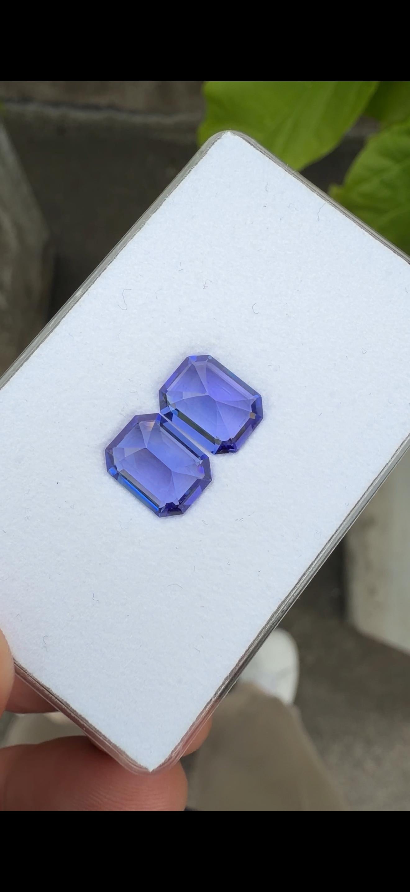 Blue Tanzanite Gemstone Pair, Emerald Cut , 4.82 CT: Title:Blue Tanzanite Gemstone Pair, Emerald Cut , 4.82 CT Description:Materials: Gemstone: Tanzanite Carat weight: 4.82 Tanzanite is strongly pleochroic and as the stone is rotated you can see blue, r