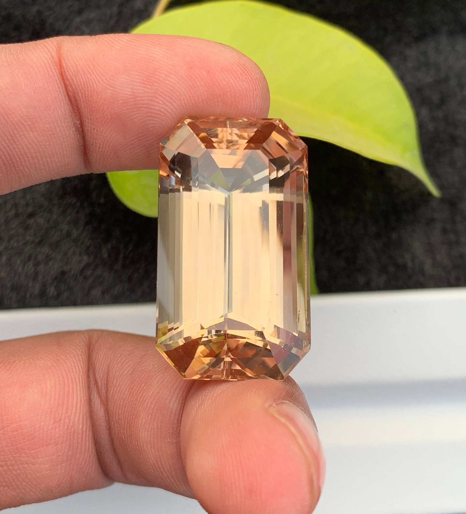 Sherry Topaz Gemstone: 83.80 Carat Emerald Cut, Eye Clean: Title:Sherry Topaz Gemstone: 83.80 Carat Emerald Cut, Eye Clean Description:Materials: Gemstone: Topaz Carat weight: 83.80 Elevate your jewelry creations with our Natural Sherry Color Topaz. This Larg