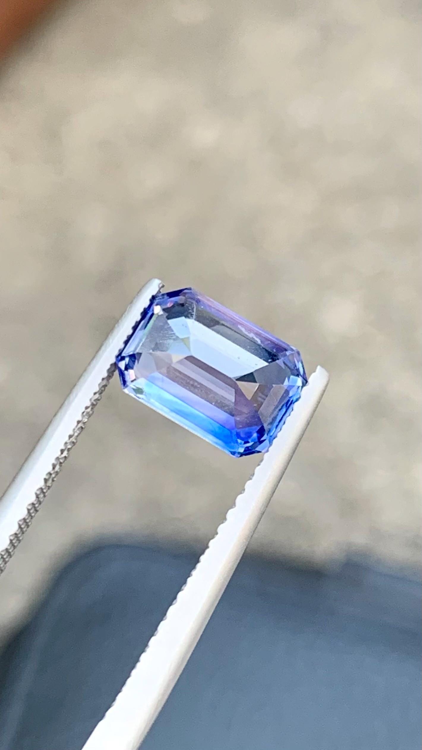 3.01 Carat Bi-Color Sapphire – Blue Emerald Cut Gemstone: Title:3.01 Carat Bi-Color Sapphire – Blue Emerald Cut Gemstone Description:Materials: Gemstone: Sapphire Carat weight: 3.01 Sapphire Details: • Weight : 3.01 Carat • Dimension : 9.10