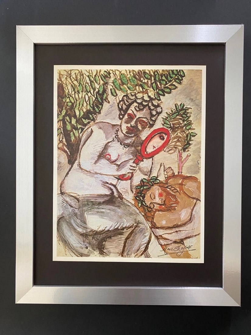 MARC CHAGALL | ORIGINAL VINTAGE 1975 PRINT | SIGNED | MOUNTED AND FRAMED: Beautiful and Scarce Original 1975 Print After Marc Chagall "The mirror" Facsimile Signature in Ink Published by Verlag Schauberg in Koln, West Germany Art Print is about 11 1/2 X 9 in. This piece is