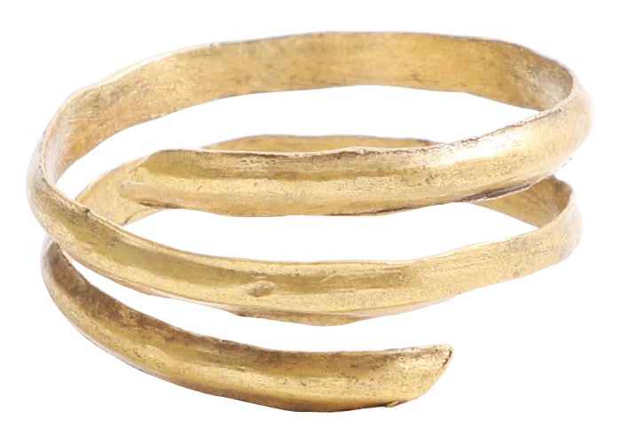 VIKING COIL RING, 9TH-10TH CENTURY, SIZE 12: Gilt bronze, two-and-a-sixth turns, and 9.1mm maximum width. Size 12 single band, flat on the back with ridged medial to the front. The coil form (helix) was a favorite for Vikings. Professionally ref