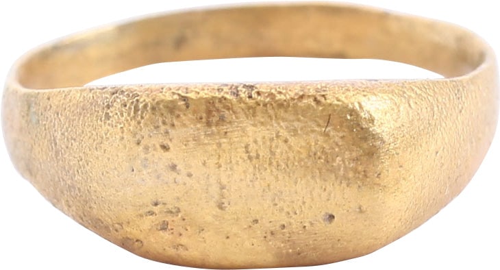 VIKING WOMAN WARRIOR’S RING 800-1000 AD: Gilt bronze, size 6 with slightly rounded face band flarin to the thick shoulders. Thick raised lozenge shaped bezel. This is a woman’s version of the large nugget rings worn by Viking men. It i