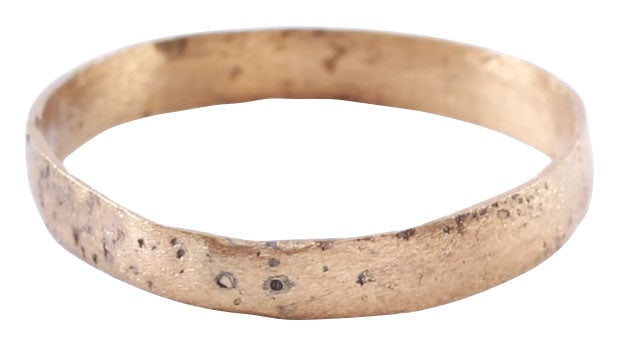 VIKING WEDDING RING, SIZE 8 3/4: Gilt bronze, provincially made. The band 3.2mm width very low rounded face. Surface textured from burial. Vikings exchanged rings on the pommel of the groom's sword. Professionally refurbished with th