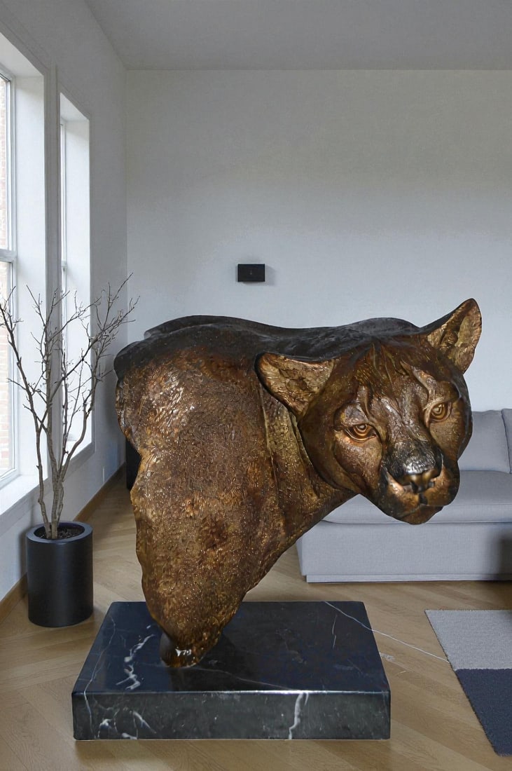 Mountain Lion Head bronze statue on a marble base - Size: 18"L x 15"W x 21"H. - 2