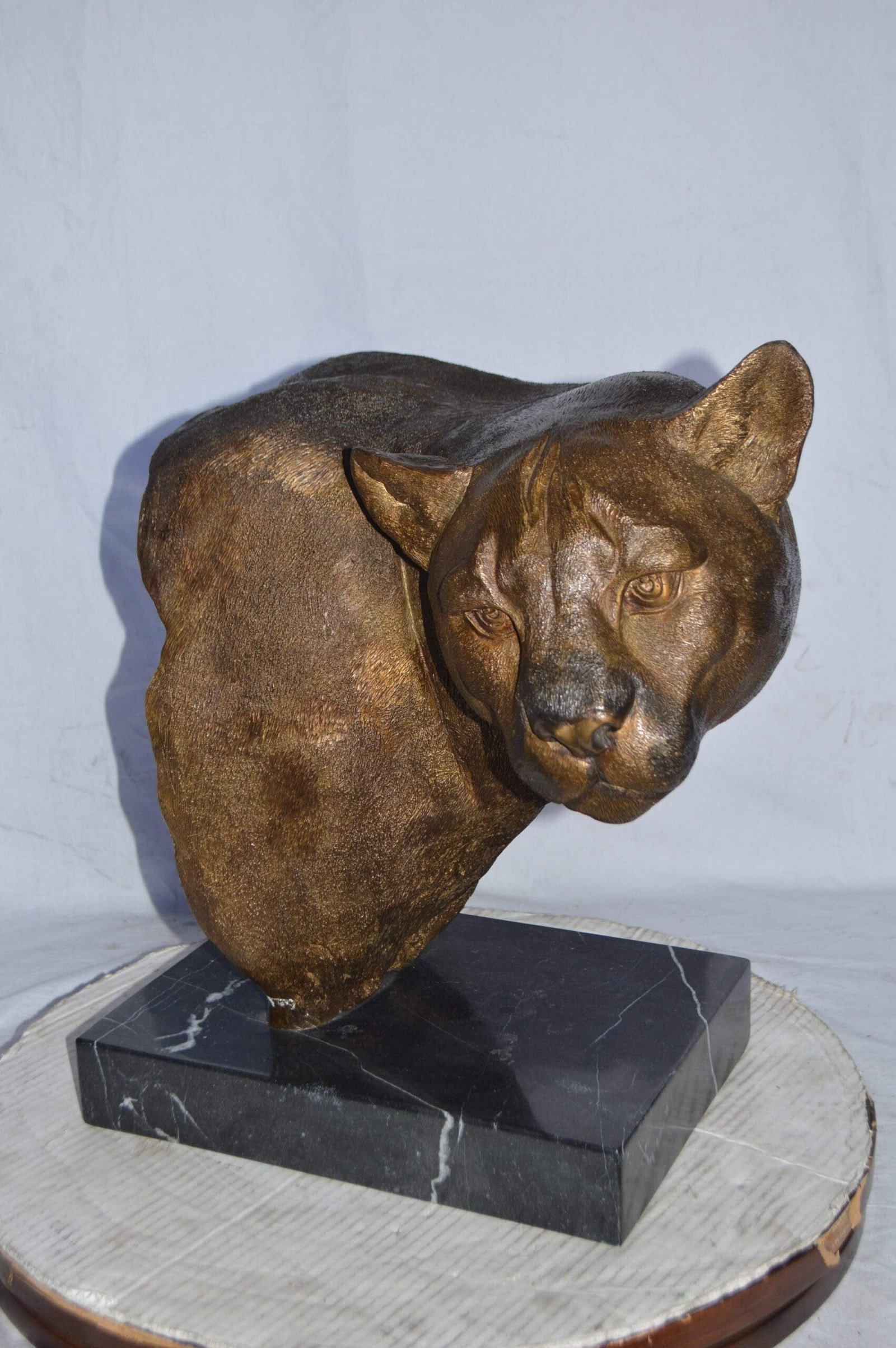 Mountain Lion Head bronze statue on a marble base - Size: 18"L x 15"W x 21"H. - 5