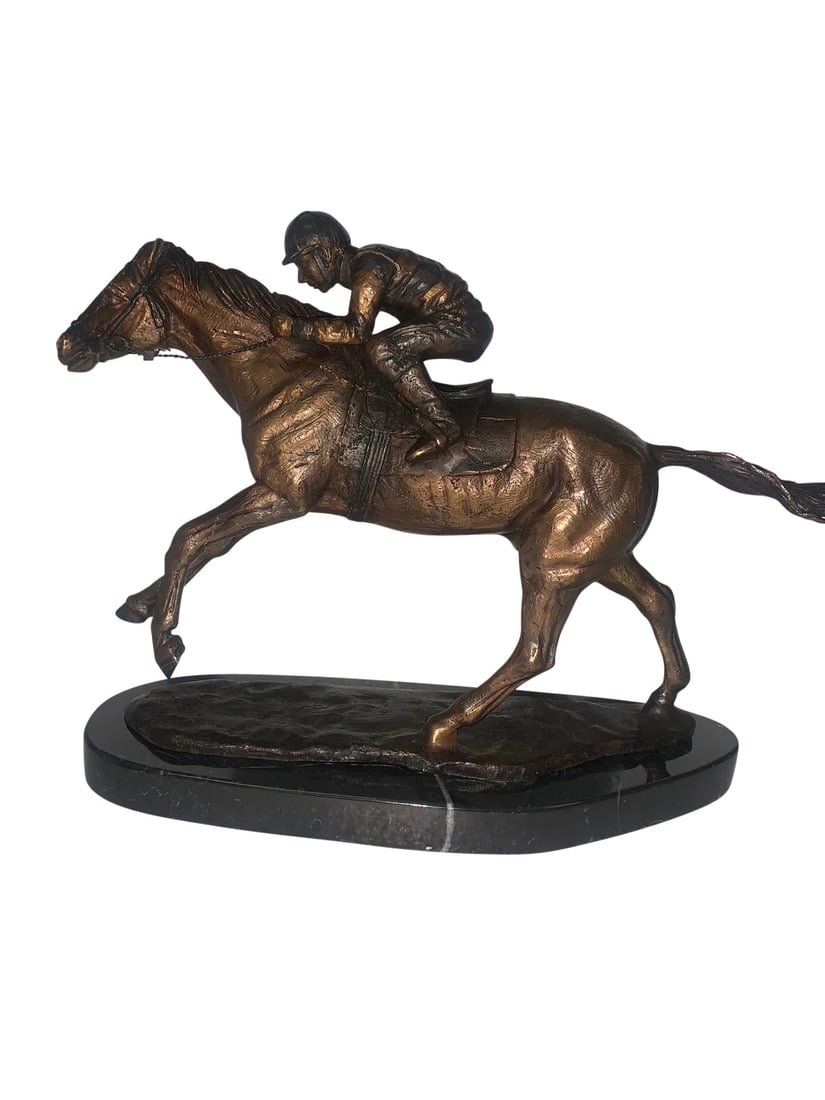 Jockey on horse two tones Bronze Statue - Size: 11"L x 4"W x 8"H.: Title:Jockey on horse two tones Bronze Statue - Size: 11"L x 4"W x 8"H.Description:Bronze statue of a horse racing with jockey. This bronze sculpture depicts the mighty Seabiscuit winning the Santa