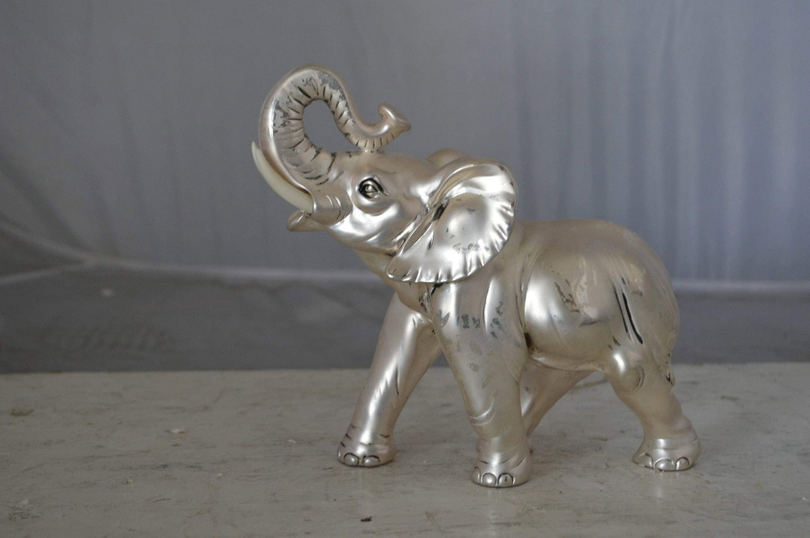 Elephant statue made of resin - Size: 9"L x 4"W x 8"H. - 8