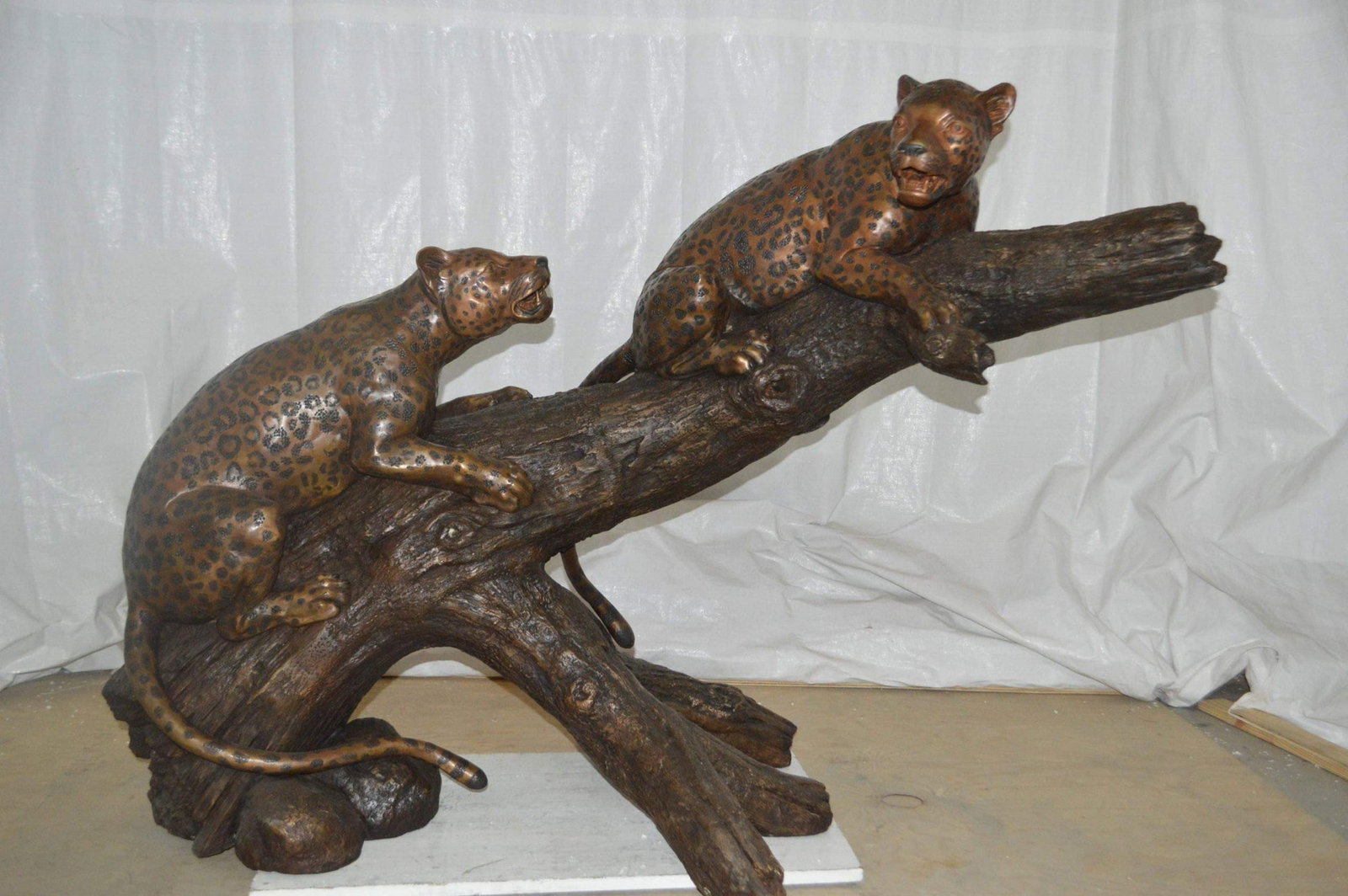 Two Jaguars On A Tree Bronze Statue - Size: 66"L x 34"W x 44"H. - 4