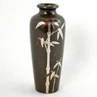 Miniature 19th C Japanese Inlaid Bronze Vase: Title:Miniature 19th C Japanese Inlaid Bronze VaseSize:1 ? in (3.8 cm) diameter x 3 ? in (8.9 cm) tall.Description:Embodying the classic Japanese aesthetic of "less is more," this heavy, cast bronze