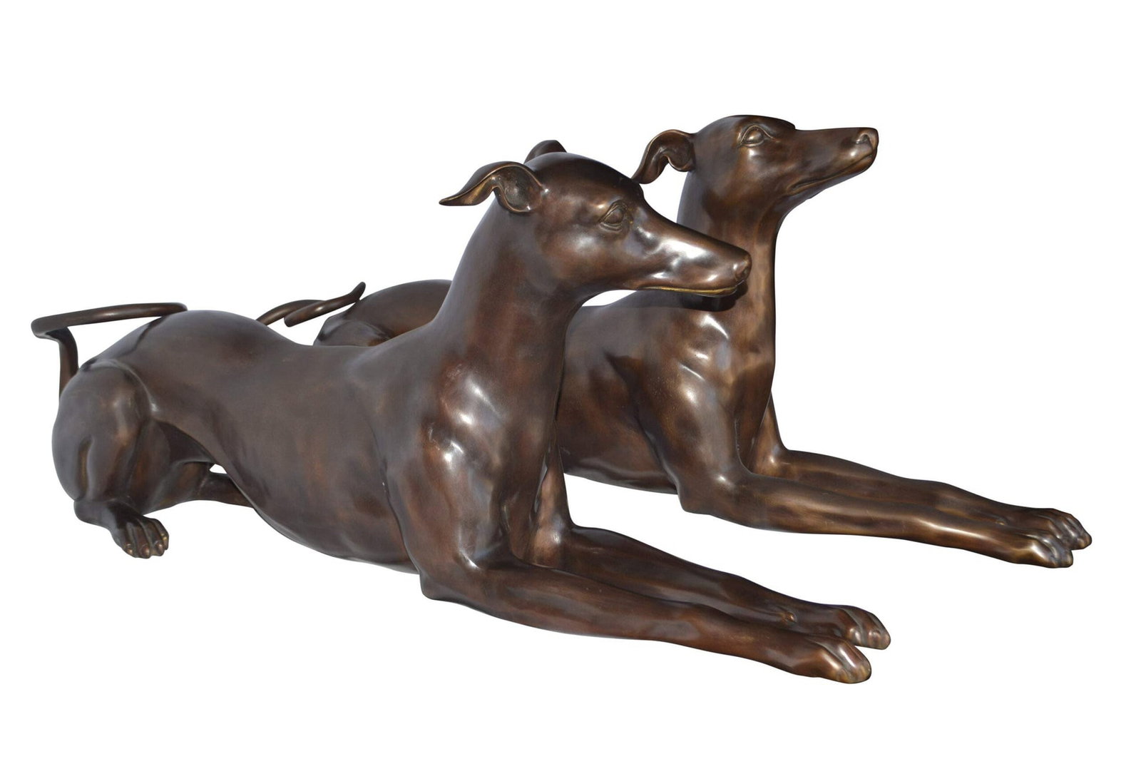 Pair of Greyhound dogs laying down Bronze Statues - Size: 50"L x 11"W x 20"H.: Title:Pair of Greyhound dogs laying down Bronze Statues - Size: 50"L x 11"W x 20"H.Description:These charming life size bronze statues depicts Beautiful pair of Greyhound dogs laying on the ground.
