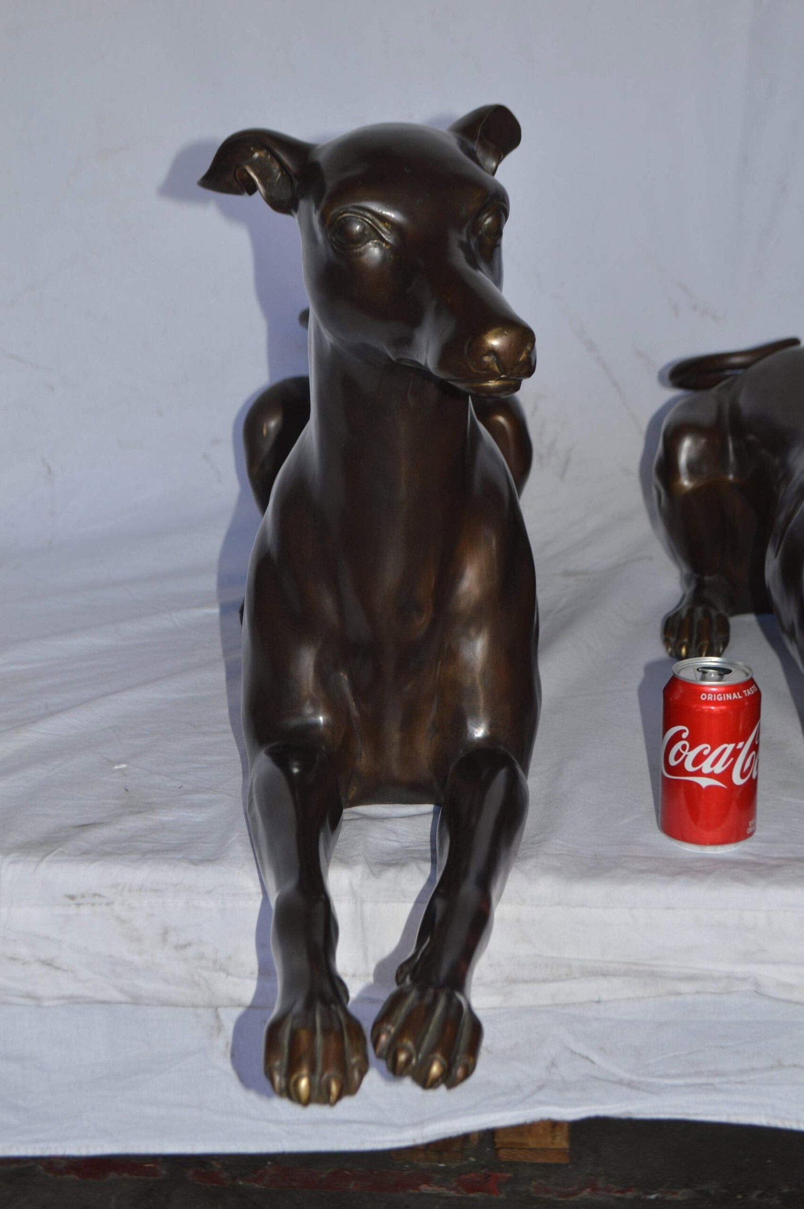 Pair of Greyhound dogs laying down Bronze Statues - Size: 50"L x 11"W x 20"H. - 6