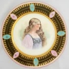 Victorian Transfer Cabinet Plate of a Beauty: Title:Victorian Transfer Cabinet Plate of a BeautySize:9 ? in (12.7 cm) diameter x 1 1/8 in (2.9 cm) deep.Description:A colorful and glittering porcelain cabinet plate with a portrait of a beautiful