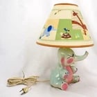 Child's Totline Elephant Lamp 1950's: Title:Child's Totline Elephant Lamp 1950'sSize: 13 ? in (34.3 cm) tall x 6 ? in (16.5 cm) long x 5 ? in (14.0 cm) wide.Description:A fun and nostalgic lamp for a children's bedroom in the shape of an