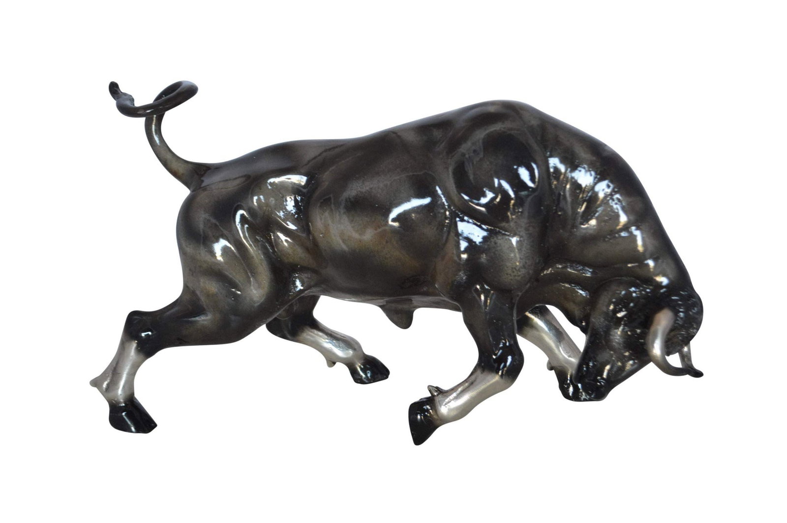 Charging Bull Bronze Statue - Size: 15"L x 5"W x 8"H.: Title:Charging Bull Bronze Statue - Size: 15"L x 5"W x 8"H.Description:This beautiful bronze statue of a bull shows its eagerness to charge. It is prancing forward, elegantly and strongly. This is a