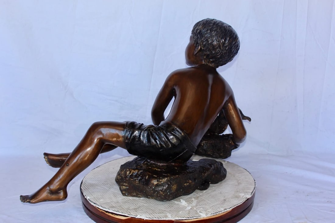 Adventurous boy with squirrel bronze statue - Size: 36"L x 18"W x 22"H. - 10