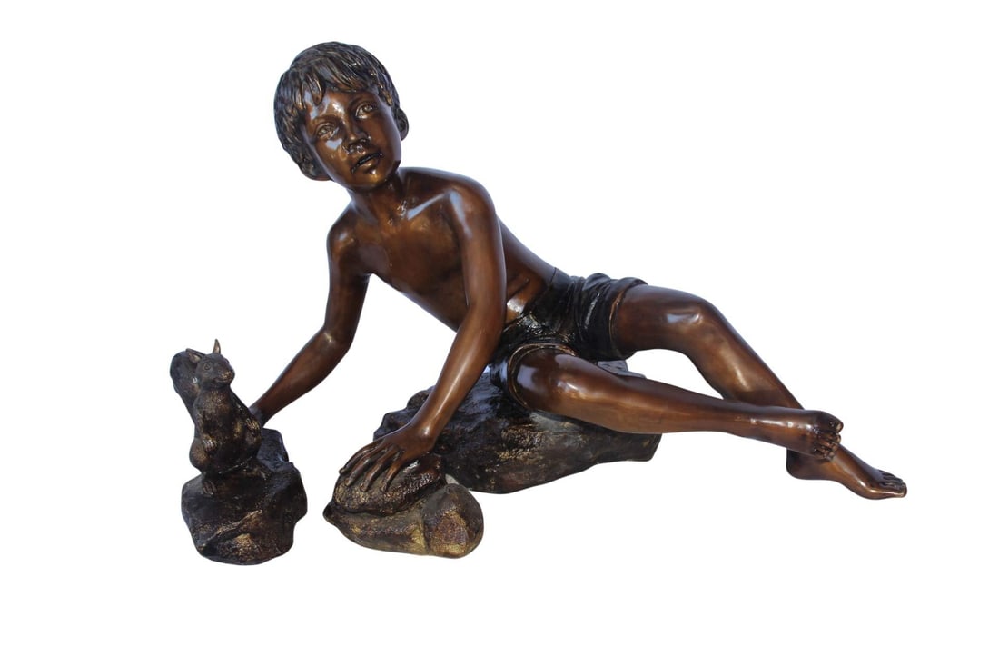 Adventurous boy with squirrel bronze statue - Size: 36"L x 18"W x 22"H.: Title:Adventurous boy with squirrel bronze statue - Size: 36"L x 18"W x 22"H.Description:The large bronze statue illustrated a real-life situation of a young boy enjoying the outdoors. Perched on