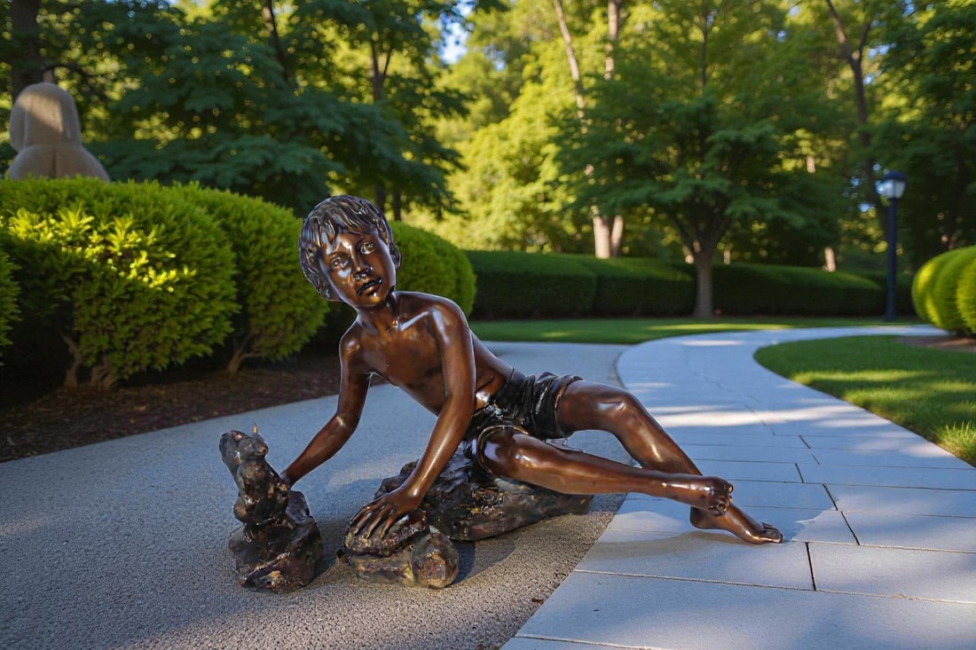 Adventurous boy with squirrel bronze statue - Size: 36"L x 18"W x 22"H. - 2