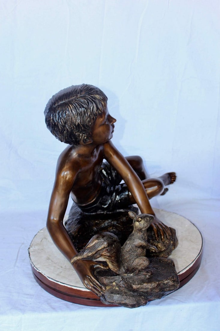Adventurous boy with squirrel bronze statue - Size: 36"L x 18"W x 22"H. - 6