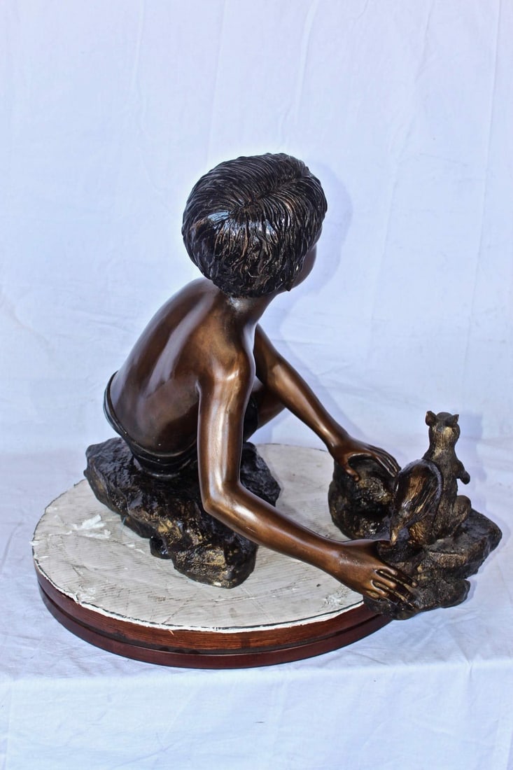 Adventurous boy with squirrel bronze statue - Size: 36"L x 18"W x 22"H. - 7